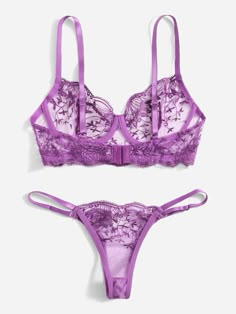 This elegant Purple See Through Lingerie Set features delicate lace, adding a touch of femininity to your ensemble. Its see-through design adds a hint of seduction to your look. Crafted with expert craftsmanship and a stylish look, this set is perfect for adding a touch of sophistication to any outfit. Seductive Lingerie, Purple Bra, Bra Materials, Purple Lingerie, Lingerie Catalog, Purple Bras, Purple Collar, Lingerie Inspiration, Rose Embroidery