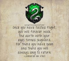 a green and black dragon with a quote on it