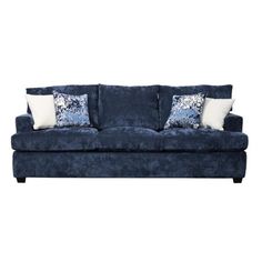 a blue couch with two pillows on it