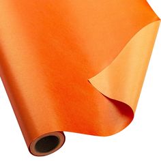 an orange colored paper is rolled up and ready to be used as a wallpaper