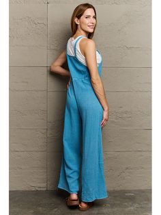 These Jumpsuit have a boyfriend-inspired loose fit and feature two pockets and tie-adjustable shoulder straps. It can be rolled up for a cropped silhouette or tied at the hip for a casual style. It's easy to wear on cool summer days, and you can wear it with simple knitted sweaters in autumn and winter. Loose fit Sleeveless Straight Adjustable shoulder straps Wide Leg Two pockets Machine wash cold SIZE US WAIST HIP LENGTH INCH CM INCH CM INCH CM S 4/6 36 92 42 107 50.5 128.5 M 6/8 38 96 44 111 5 Wardrobe Pattern, Unique Designers, Wide Leg Jumpsuit, Dresses With Leggings, Hip Length, Dress Accessories, Square Neck, Effortless Style, Casual Style