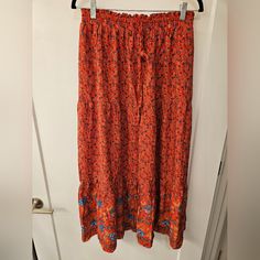 Nwt - Bohemian Zesica Elastic Waist & Drawstring Floral Maxi Skirt - Size L 100% Rayon Length - C. 37" Waist - C. 14.5" Stretches To C. 19.5" Red Skirt With Elastic Waistband For Vacation, Red Tiered Skirt Bottoms For Beach, Red Long Skirt For Vacation, Casual Boho Print Skirt For Festivals, Casual Festival Skirt With Boho Print, Red Maxi Skirt With Elastic Waistband For Beach, Red Relaxed Maxi Skirt For Vacation, Relaxed Red Maxi Skirt For Vacation, Red Hippie Bottoms For Vacation