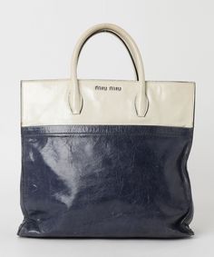 Auth Miu Miu Handbag Tote Bag Navy White Leather Used From Japan Description Condition: B (Good Condition But Signs of Small Scratches and / or Stains) General: Signs of Wear, Stain, Scratches Color Navy White Size (Approx): W 32.5 cm H 32cm D 8 cm < BR> SIZE (Approx): W 12.8inch H 12.6inch D 3.15inch Condition: B  N : (New)  S : (Almost brand new)  A : (Great condition Light signs of use with tiny scratches and/or stains)   B : (Good condition but signs of small scratches and/or stains)  C : (N Pre-owned Leather Bag With Double Handle, Pre-owned Leather Bags For Daily Use, Pre-owned Rectangular Bags For Daily Use, Pre-owned Tote Bags, Pre-owned Tote Bags For Daily Use, Pre-owned Satchel Bag, Pre-owned Satchel Bag For Daily Use, Pre-owned Leather Shoulder Bag For Daily Use, Pre-owned Leather Shoulder Bag For Everyday Use