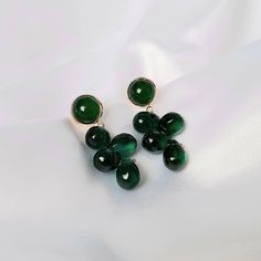 Don't miss out on these beautiful green bead drop earrings. They work with a large variety of looks and add a bit of sparkle to your outfit. MORE jewellery pieces available on our shop! Any questions please message we are happy to help. Free postage in UK Thank you for shopping with us Heather&Bumble 📪Follow us at: Instagram: heatherandbumble Twitter: Heather_Bumble Pintrest: Heather & Bumble Green Bead Drop Earrings -  Bead Earrings,Bead Jewellery,Green Earrings In The UK,Green Jewellery In The UK,Emerald Green,Gold Earrings Luxury Green Drop Earrings, Classic Green Pear-shaped Earrings, Luxury Green Pearl Earrings, Festive Dual-tone Green Earrings, Luxury Green Pearl Earrings, Elegant Style, Beaded Drop Earrings, Tiny Earrings, Green Jewelry, Jewelry Card