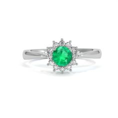 Intense Round Emerald circled with VS1 White Diamonds in an 18k White Gold setting. The Emerald is 4.50 x 4.50 x 3.05mm and has minor clarity enhancement. The Diamonds have no enhancement.  #emerald  #engagementringssimple #gorgeousrings #ringstyles #weddingringsemerald #emeraldweddingring Luxury Green Diamond Ring With Brilliant Cut, Luxury Green Diamond Ring With Vvs Clarity, Green Diamond Ring For Formal Occasions, Dazzling Green Diamond Ring With Brilliant Cut, Dazzling Green Emerald Diamond Ring, Dazzling Green Diamond Ring For Formal Occasions, Dazzling Green Diamond Ring, White Gold Emerald Cluster Ring With Vvs Clarity, Classic Green Diamond Cluster Ring