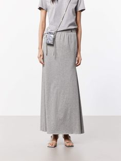 MO&Co. Women's Elasticated Waist Maxi Skirt This flowing maxi skirt is crafted from a soft and breathable cotton blend fabric, making it perfect for warm weather wear. It has a high-waisted design that sits comfortably at the natural waistline, while the A-line silhouette creates a flattering, feminine shape that gently flares out towards the hem. An elasticated waistband ensures a comfortable and flexible fit. Pair this skirt with a tucked-in T-shirt for a chic and put-together look. Features : Versatile Relaxed Fit Gathered Maxi Skirt, Relaxed Maxi Skirt With Elastic Waistband For Loungewear, Stretch Lined Maxi Skirt For Daywear, Flowy Long Skirt For Loungewear, Fitted Cotton Skirt For Loungewear, Casual Maxi Skirt With Relaxed Fit For Daywear, Cotton Skirt With Elastic Waistband For Loungewear, Spring Casual Maxi Dress With Relaxed Skirt, Casual Maxi Dress For Spring With Relaxed Skirt