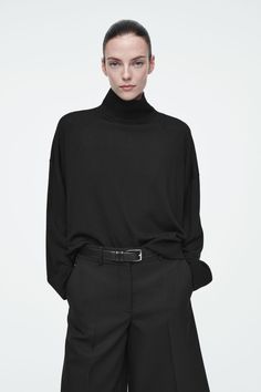 MERINO WOOL TURTLENECK SWEATER - BLACK - Knitwear - COS Belted Cape, Black Knitwear, Wool Turtleneck Sweater, Turtleneck Jumper, Land Management, Turtle Neck Jumper, Denim T Shirt, Classic Sweater, Women Magazines