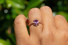 Natural Amethyst Ring, Vintage Inspired and paired with a V Shaped band, made of 10k Gold with the color of your choice Main Ring Gemtype: Natural Amethyst Main stone size: 4x6mm side Stone: D color Moissanite Metal Type: 10k Gold , color of your choice Metal Stamp: 10k Stone Origin: Brazil V shaped Band Metal Type: 10k Gold Stone: Moissanite Stone color: D Packaged in a gift ready box. Perfection takes time, please allow 2-3 weeks production time. thanks IMPORTANT: Sizes Fit True, please always Lavender Amethyst Ring For Anniversary, Dainty Amethyst Wedding Ring With Prong Setting, Heirloom Style Purple Promise Ring, Heirloom Purple Promise Ring, Amethyst Halo Setting Birthstone Ring For Wedding, Amethyst Halo Setting Wedding Birthstone Ring, Purple Birthstone Ring With Halo Setting For Wedding, Amethyst Halo Wedding Birthstone Ring, Purple Amethyst Halo Wedding Ring