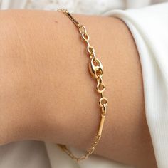 Dainty Bracelet in 14k Solid Yellow Gold | Paperclip Chain Link Bracelet | Gold Jewelry Gift for Women *Free Express International Shipping *Next business day shipping PRODUCT DETAILS *The product is made of 100% 14k Solid Gold  *       It has a 14K or 585 stamp on item. (We don't sell filled or plated jewelry) *The package includes a gold certificate.  *Every package comes in a gift box. *The bracelet's primary color is yellow gold. *       Made in Türkiye. BRACELET SIZE CHART *XS- 6 inches (15.50cm) *S -   6.50 inches (16.50cm) *M- 7 inches (18cm)  -usually preferred  *L- 7.50 inches (19cm) *XL- 8 inches (20.50cm) ORDER PROCESS *Choose a length option. You can easily select your bracelet sizes as above. *The price increases as the length increases since the product is real solid gold. *W Classic Everyday Bracelets With Spring Ring Clasp, Elegant Chain Bracelet With Rectangular Links As Gift, Elegant Chain Bracelet With Rectangular Links For Gift, Elegant 14k Gold Paperclip Bracelet Gift, Elegant Gold-plated Paperclip Chain Bracelet, Timeless 14k Gold Chain Bracelet With Spring Ring Clasp, Elegant Yellow Gold Tarnish Resistant Paperclip Bracelet, Elegant Gold Bracelet With Paperclip Chain For Gift, Dainty Oval Link Bracelets For Formal Occasions