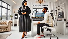 a man and woman are sitting in front of a computer desk with speakers on it