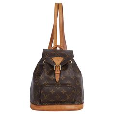 Authentic, pre-owned Louis Vuitton brown monogram Montsouris Pm backpack. Features brown monogram canvas with leather trim, front zippered pouch, and top string closure with buckle front flap, the interior has a brown textile lining, and adjustable shoulder straps. This bag is perfect for shopping, travel, school, and hands-free needs. Unisex bag! Authenticity date code: SP0937 Made in 1997 SIZE 8.25"L x 3.75"W x 8.75"H Condition Gently Used Exterior scuff, stains and marks on the leather parts, patina coloring, straps are strong at the base, the interior is clean with some signs of use and stains. The overall condition is very nice. Please look at every detail of the photos. Use the enlarge button to enlarge the photos. May have on the interior and the exterior dirtiness, signs of rub, co Daily Monogram Canvas Backpack With Adjustable Strap, Daily Use Monogram Canvas Backpack With Adjustable Strap, Brown Monogram Canvas Backpack, Classic Brown Monogram Canvas Backpack, Mochila Louis Vuitton, Montsouris Pm, Lv Backpack, Louis Vuitton Store, Louis Vuitton Pink