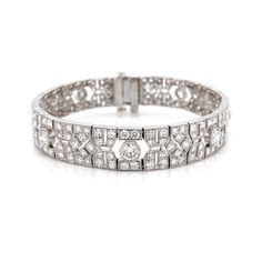 This is a beautiful retro inspired diamond link platinum bracelet. Covered by splendid round cut white natural diamonds 10.21 ct in total. Diamonds are all natural in G-H Color Clarity VS. Platinum 950 metal. Length: 17.4 cm Width. 1 cm Weight: 31 g Exquisite Platinum Diamond Bracelet With Brilliant Cut, Exquisite Platinum Tennis Bracelet With Diamond Accents, White Gold Platinum Diamond Bracelet For Wedding, Luxury Platinum Diamond Bracelet With Single Cut Diamonds, Exquisite Platinum Diamond Bracelet With Single Cut Diamonds, Exquisite Platinum Diamond Cut Bracelet, Exquisite Diamond Cut Platinum Bracelet, Wedding Platinum Diamond Bracelet In Diamond White, Wedding Diamond White Platinum Bracelet