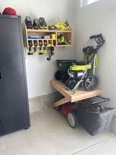 a garage with tools and equipment on the shelves