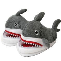 a pair of slippers with a shark's mouth