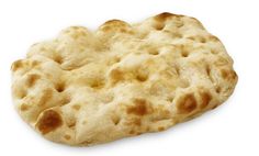 an uncooked pita bread is shown on a white background with clippings