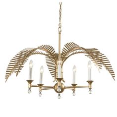 a gold chandelier with four candles hanging from the bottom and two leaves on each side