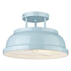 a light that is on top of a white ceiling fixture with a blue shade over it