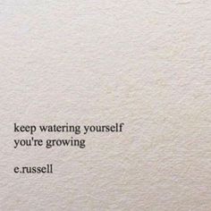 a white wall with a quote on it that says, keep watering yourself you're growing c russell