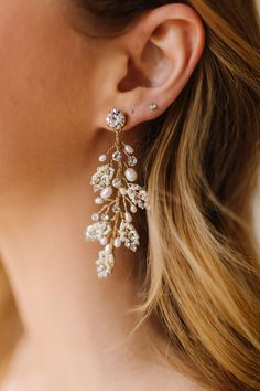 These stunning earrings are available in Gold and Silver, detailed with pearls, crystals and tiny beads in a floral leaf design. Exquisite Jeweled Earrings For Wedding, Elegant Jeweled Beaded Drop Earrings, Elegant Jeweled Gold Beaded Earrings, Elegant Gold Jeweled Beaded Earrings, Jeweled Dangle Beaded Earrings For Wedding, Jeweled Beaded Dangle Earrings For Wedding, Wedding Beaded Dangle Flower Earrings, Elegant Beaded Earrings For Wedding, Beaded Dangle Flower Earrings For Wedding