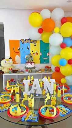 a pokemon themed birthday party with balloons and decorations