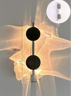 a close up of a light fixture with measurements