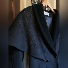 Check Out This Stunning Vintage Charles Klein Forstmann Black Wool Blend Duster Cape Coat Cloak, Complete With Beautifully Finished Embroidery And Beading On The Capelet. I'm A Goth Grrl At Heart And So Wish This Fit Me, But It Doesn't -- Please Buy Her And Wear Her Out In The World! Other Style Descriptors Would Be Opera Coat, Sherlock Holmes Detective Coat. Velvet Shawl Collar. Fully Lined With Sewn In Shoulder Pads, Two Side Pockets, Double Breasted Button Placket. Excellent Craftsmanship And Materials, Featuring An Ilgwu Made In Usa Label. In Excellent Condition With No Noticeable Stains Or Tears. It May Even Be Deadstock, Considering There Are Labels Stapled Into The Inner Front Bottom Detective Coat, Goth Jacket, Opera Coat, Velvet Shawl, Vintage Cape, Cape Coat, Union Made, Front Bottoms, Coat Design