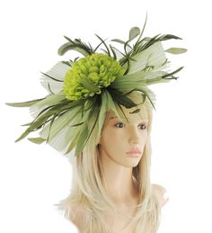 Beautiful Olive green crin fascinator with large flower and coque feather trim Measures about 12 inches wide It is mounted with a headband. We will always try and match the fascinator colour to the headband. If the colour is unavailable then we will use BLACK. If you dont want black please state your hair colour at checkout and we will use a band that matches your hair. Unsure about colour? We send can send free colour samples anywhere in the world. Simply email us with colours and address. Samp Green Headband For Royal Ascot Wedding, Green Headband For Wedding At Royal Ascot, Green Wedding Headband For Royal Ascot, Fitted Green Costume Hats And Headpieces For Garden Party, Fitted Green Headband For Spring, Green Fitted Costume Hat For Church, Green Fitted Fascinator For Races, Green Fitted Fascinator For Church, Fitted Green Fascinator For Races