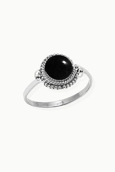 Sanskrit for divine, Divya symbolizes the life energy within us which connects to the divine energy of the universe. Our Divya ring is handcrafted in fine sterling silver, with signature textured detailing and an authentic large solitaire gemstone as a centerpiece, adding sophistication to your everyday look. Authentic Sivalya Black Onyx Hallmarked Metal: 925 Sterling Silver Gemstone Size: 10mm x 10mm Cut: Round Shaped Smooth Cabochon Black Onyx: Endurance, Perseverance, Grounding Elegant Silver Stackable Rings With Natural Stones, Spiritual Onyx Ring Jewelry, Black Spiritual Round Rings, Life Energy, Divine Energy, Sanskrit, Jewelry Cleaner, The Divine, Crystals And Gemstones