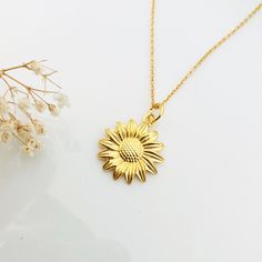 "Gold sunflower necklace, sunflower jewellery, Sunshine Necklace, Flower Necklace, Sunflower Pendant , flower necklace for her This detailed openwork sunflower charm looks realistic and feminine, it is a perfect everyday necklace. This beauty can be personalized with birthstone crystal and/or initial. Very good size and solid weight but not heavy. The sunflower is a strong symbol of positive emotions, happiness and loyalty, it rises and blooms to a beautiful bright and sunny flower. It will be a Sunflower Design Jewelry For Mother's Day, Elegant Sunflower Design Flower Pendant Jewelry, Yellow Gold Jewelry With Sunflower Design As Gift, Mother's Day Sunflower Design Jewelry, Elegant Necklace With Sunflower Pendant, Elegant Necklaces With Sunflower Design For Gifts, Elegant Sunflower Design Necklaces For Gift, Elegant Sunflower Design Necklaces As Gift, Sunflower Design Round Jewelry Gift