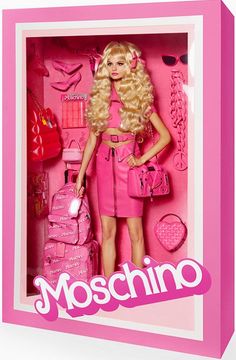 a barbie doll with blonde hair and pink outfit in a pink box holding a handbag