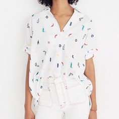 Madewell Embroidered Back-Button Shirt. Embroidery In Different Colors And Objects (Dolphins, Bottles, Fruit, Drinks, Etc.). Meant To Be Very Loose Fitting. Armpit To Armpit Is 24” And Armpit To Bottom Is 12-15.” White Top With Button Closure And Camp Collar, White Spring Camp Shirt With Buttons, White Cotton Camp Collar Blouse, White Cotton Blouse With Camp Collar, Preppy Cotton Tops For Day Out, Preppy Summer Tops With Button Closure, White Preppy Blouse For Spring, Preppy White Blouse For Spring, Trendy White Camp Shirt For Spring