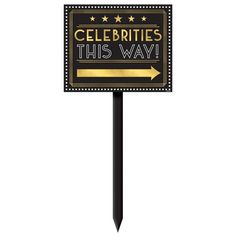 a sign that says celebrate this way with an arrow pointing to the right and stars on it