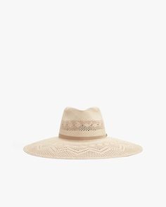 A chic accessory for sunny days, handwoven with love from natural Toquilla straw in an intricate pattern by Ecuadorian artisans. It features an adjustable elastic band at the interior for a perfect fit. Woven Toquilla Straw Panama Hat With Flat Brim, Artisan Woven Straw Hat For Spring, Artisan Woven Fedora Panama Hat, Woven Straw Panama Hat With Flat Brim, Woven Toquilla Straw Hat Bands For Summer, Artisan Woven Panama Hat For Spring, Woven Toquilla Straw Hat Bands For Rodeo, Artisan Panama Hat For Spring Beach, Artisan Straw Hat With Curved Brim For Spring