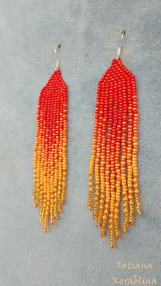 These handmade earrings are made of high-quality Czech beads and strong synthetic thread. They are elegant, fashionable, and highly versatile, suitable for everyday wear. Color: red, orange. There may be some color discrepancies which is due to the different monitor settings 100% hand made with love! Measurements: Length-about 11cm (4.3 inch) Width -about 2 cm (0.79 inch) Materials: Sterling silver components Czech glass beads Strong bead weaving thread Red Beaded Earrings With Tassels And Round Beads, Red Beaded Earrings With Tassels, Handmade Red Tassel Earrings With Round Beads, Red Round Beads Jewelry With Tassels, Red Tassel Jewelry With Round Beads, Red Jewelry With Tassels And Round Beads, Handwoven Red Earrings, Adjustable Red Handwoven Earrings, Orange Tassel Earrings With Colorful Beads As Gift