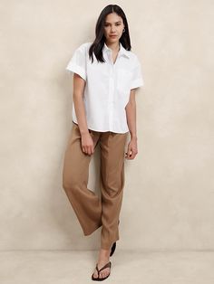 Pocket Poplin Shirt | Banana Republic Factory Short Sleeve Office Blouse With Pockets, Relaxed Fit Poplin Top For Work, Chic Poplin Shirt For Work, Chic Poplin Top With Relaxed Fit, Modern Shirt For Workwear With Rolled Sleeves, Modern Shirt With Rolled Sleeves For Work, Modern Workwear Shirt With Rolled Sleeves, Modern Tops With Shirttail Hem For Work, Chic Button-up Poplin Blouse