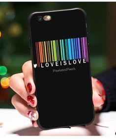 a woman holding up her phone case with the words love is love on it