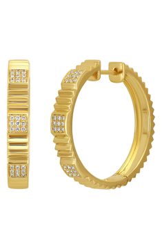 Fluted edges and diamond pavé ensure you catch light from every angle in these handcrafted hoops. 1" hoop diameter; 1/8" width Total diamond weight: 0.32ct. Color: G Clarity: VS 18k gold/diamond Imported >Diamond Guide Luxury 14k Gold Hoop Earrings With Pave Setting, Modern Gold Hoop Earrings With Pave Setting, Modern Hoop Jewelry With Pave Setting, Luxury Gold Hoop Earrings With Pave Setting, Luxury Tarnish Resistant Hoop Huggie Earrings, Luxury Pave Set Hoop Earrings, Luxury 14k Gold Hoop Earrings With Single Cut Diamonds, Gold Luxury Hoop Earrings With Single-cut Diamonds, Luxury Small Hoop Earrings With Pave Setting