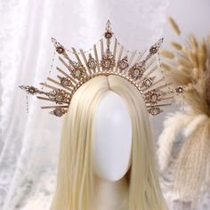 👑 Product Description:  -- Appearance: Gold Wedding Spiked Crown Halo Golden Tiara with Chain,Fairy Brida Hair Jewelry Costume,Princess Crown,Large Headband Photo Prop Headpiece In this exquisite gold wedding halo crown with chain, elegance and unique design come together to offer brides a stunning headpiece. Crafted in noble gold, this dazzling crown is adorned with shimmering colored gems, each meticulously hand-set to radiate with splendid brilliance. Its design not only showcases grandeur and sophistication but also incorporates delicate chain embellishments, enhancing its overall refinement and uniqueness. Whether paired with a wedding gown or evening dress, or given as a precious gift to someone special, this crown will add a distinct radiance to your attire, making you the center o Spiked Crown, Golden Tiara, Crown Halo, Costume Princess, Wedding Halo, Halo Crown, Diy Crown, Headpiece Jewelry, Precious Gift