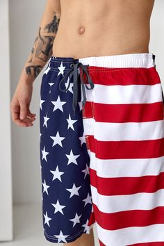 Patriotic Beach Shorts With American Flag Print, Patriotic American Flag Print Shorts For Beach, Beach Shorts With Flag Print, Patriotic American Flag Print Beach Bottoms, American Flag Print Bottoms For 4th Of July Beach, Patriotic Beach Bottoms With American Flag Print, 4th Of July Beach Bottoms With Flag Print, Patriotic Summer Vacation Bottoms, Shorts For 4th Of July Beach Events