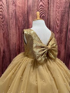 Gold Princess Dress For Kids, Princess Style Gold Gown For Dress-up, Gold Princess Pageant Dress For Dress-up, Gold Princess Dress For Holiday Dress-up, Gold Sleeveless Princess Dress For Wedding, Sleeveless Gold Princess Dress For Wedding, Gold Tulle Princess Dress For Wedding, Princess Gold Pageant Dress, Princess Style Gold Ball Gown For Dress-up