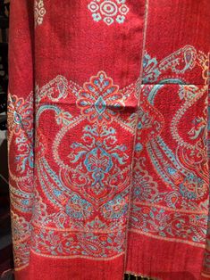 Red with beige and blue brocade weave Vintage styled wrap 28 X 70 Nice brocade paisley Very soft silk blend Styled from ancient Jamawar Indian motifs These are replicated from vintage shawl collections by my own company We may have larger quantities available for weddings, bridesmaids, or wholesale orders. Please inquire. All shipped free in the US Please check out our THOUSANDS of great reviews Embroidered Red Pashmina Shawl In Jamawar, Traditional Red Jamawar Shawl, Red Silk Pashmina Shawl, Red Silk Bohemian Pashmina Shawl, Red Embroidered Pashmina Scarves, Elegant Red Pashmina Shawl In Traditional Drape, Elegant Red Pashmina Shawl, Bohemian Red Jamawar Scarves, Red Silk Shawl For Festivals