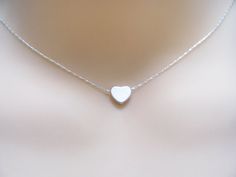 Heart+Necklace+Tiny+silver+heart+necklace+Small+dainty+by+MonyArt,+$19.80 Minimalist Hypoallergenic Heart Charm Necklace, Dainty Silver Necklace With Heart Beads, Silver Heart Beads Charm Necklace For Wedding, Hypoallergenic Heart Charm Necklaces For Everyday, Hypoallergenic Heart Charm Necklace For Everyday, Silver Wedding Charm Necklace With Heart Beads, Wedding Silver Charm Necklaces With Heart Beads, Everyday Hypoallergenic Heart Charm Necklace, Simple Silver Necklaces For Mother's Day