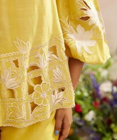 Editor's Note Featuring a yellow chanderi contrast applique and cutwork shirt Note: Pant worn by model is for styling purposes and can be purchased separately. Color: Yellow Fabric: Chanderi Component: Shirt Occasion: Daywear and party Care: Dry Clean Only About the Designer Chandrima celebrates diversity in cultures and craft forms creating ready-to-wear women wear for the urban woman of today. The brand embodies the idea of Indian handloom and craft merged with an international style. Label Ch Emb Designs, Cutwork Embroidery, Yellow Shirt, Embroidered Collars, Embroidery Suits Design, Scallop Trim, Boutique Dress Designs, Embroidery Designs Fashion, Pattern Embroidery