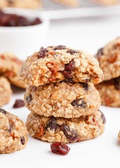 several oatmeal cookies stacked on top of each other with raisins