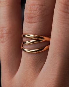 This is a gorgeous, unique ring set made up of three individual, entwined rings. These are a favorite for both men and women. Customize the finish, metal type and more to create your own perfect ring! This listing is for one single Interlocking ring set made up of 3 INDIVIDUAL RINGS which are permanently entwined. Each band measures approx. 2mm in width and is made from a D-Shaped, half round metal. This Interlocking ring set includes three 14K GOLD FILL rings. These Interlocking rings can me ma Gold Stackable Rings With Polished Finish And Modern Twist, Gold Double Band Rings With Modern Twist, Gold Ring With Polished Finish And Modern Twist, Modern Gold Ring With Polished Finish, Modern Twist Double Band Gold Rings, Modern Twist 14k Gold Midi Rings, Modern Gold Toe Ring, Timeless 14k Gold Bypass Ring, Gold Timeless Bypass Ring For Promise