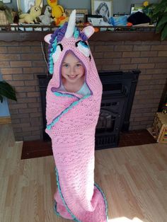 "Our hooded unicorn blanket is sure to brighten anyones day. It can be made in any colors. It is made in a smoke free home, from acrylic yarn and polyester fiber fill. It is available in 3 sizes. Toddler (approx 36\"×36\") child (approx. 42\"×42\") and adult. Please message us if you would like to choose your colors. This beautiful blanket is perfect for play or for snuggling up watching a movie or reading a book. Please note, if you order multiple items, processing time may be longer." Crochet Hooded Blanket, Unicorn Hooded Blanket, Yarn Chart, Crochet Unicorn Blanket, Crochet Plastic Canvas, Cape Crochet, Crochet Unicorn Hat, Crochet Unicorn Pattern, Blanket Cape