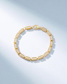 Crafted with 18-karat gold, this block-chain bracelet presents a symphony of four-sided links set with pave white diamonds. The thick, block-chains add a contemporary edge to the timeless design making it perfect for casual or evening wear. Details 18k yellow gold, rose gold or white gold 7.14 carats of pave white diamonds on 7" bracelet 7" bracelet inch is adjustable at 6.5" inches 8.50 carats of pave white diamonds on 8" bracelet 8" inch bracelet is adjustable at 7.5" inches 4mm link thickness Gold Tennis Bracelet With Rectangular Diamond Links, Gold Diamond Tennis Bracelet With Rectangular Links, Gold Diamond Bracelet With Rectangular Links For Everyday Luxury, Gold Chain Bracelet With Diamond Rectangular Links, Luxury Gold Diamond Bracelet With Box Chain, Luxury Chain Bracelet With Rectangular Cubic Zirconia Links, Classic Cubic Zirconia Diamond Chain Bracelet, Luxury Chain Bracelet With Cubic Zirconia, Luxury Formal Chain Bracelet With Pave Setting