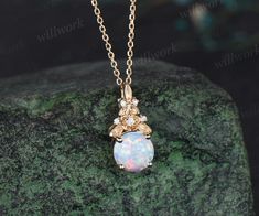 - Metal: Solid gold(14K/18K white/yellow/rose gold),925 sterling silver, platinum available- Main Stone: 6.5mm round lab opal- Accent Stone: diamonds or moissanites- Chain: 16+2 inches. The chain can be adjustable to 18 Inches.- Can be personalized: Yes Gold Opal Jewelry With Prong Setting, Gold Opal Jewelry With Round Cut, Elegant Opal Jewelry With Round Stone, Elegant Round Stone Opal Jewelry, White Opal Anniversary Necklace, Elegant Round Opal Jewelry, Elegant Round Opal Necklace, Elegant Opal Round Pendant Jewelry, Elegant Round Opal Pendant Jewelry