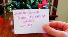 someone holding up a note that says, november december resume lightening schedule when dry