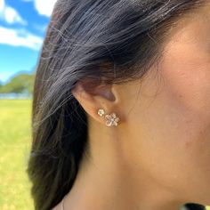 The Plumeria line is inspired by exotic Plumerias which are found blooming on every Hawaiian Island. Evoke the unique fragrance found in these beautiful blossoms and rediscover memories in Paradise with our Plumeria Collection. Plumeria Design Earrings 14k Rose Gold 11mm Natural Diamond: 0.03 CTW Locally Made in Hawaiʻi Forever Guarantee (Lifetime Warranty on the life of the piece) Free Shipping on USA Orders $100 or more Delicate Rose Gold Jewelry With 3d Flowers, Fine Jewelry Flower Earrings For Anniversary, Flower Shaped Fine Jewelry Earrings For Anniversary, Rose Gold Sterling Silver Flower Earrings, Elegant Rose Gold Jewelry With 3d Flowers, Delicate Rose Gold Earrings As Gift For Her, Elegant Rose Gold Pierced Flower Earrings, Elegant Blossom Jewelry For Anniversary, Elegant Wedding Earrings With Birth Flower